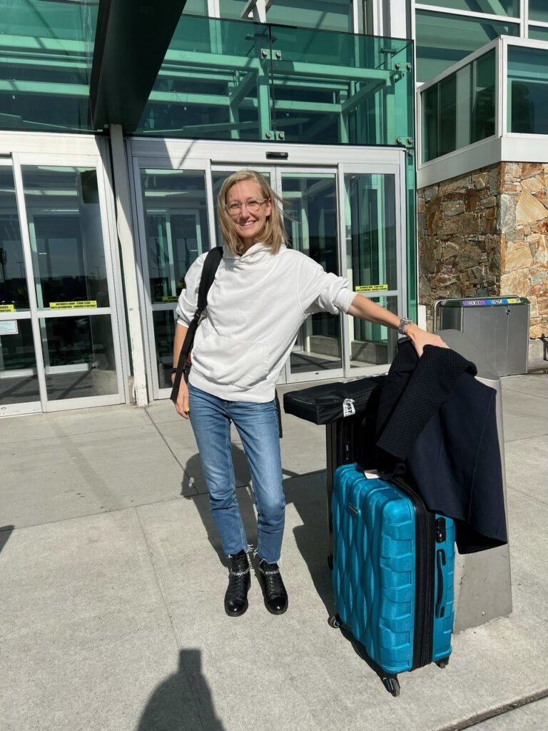 Caitlyn at the airport ready to fly to Toronto